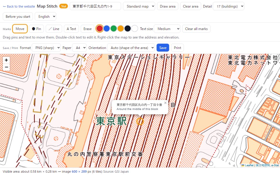 The result of an address search. An orange circle marks the found block with a bubble showing Marunouchi 1-chome block 9